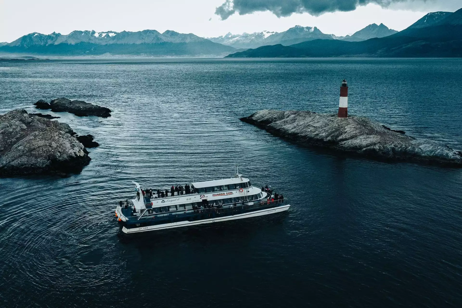 Winter Beagle Channel Navigation. Lighthouse and Sea Lions – Catamaran